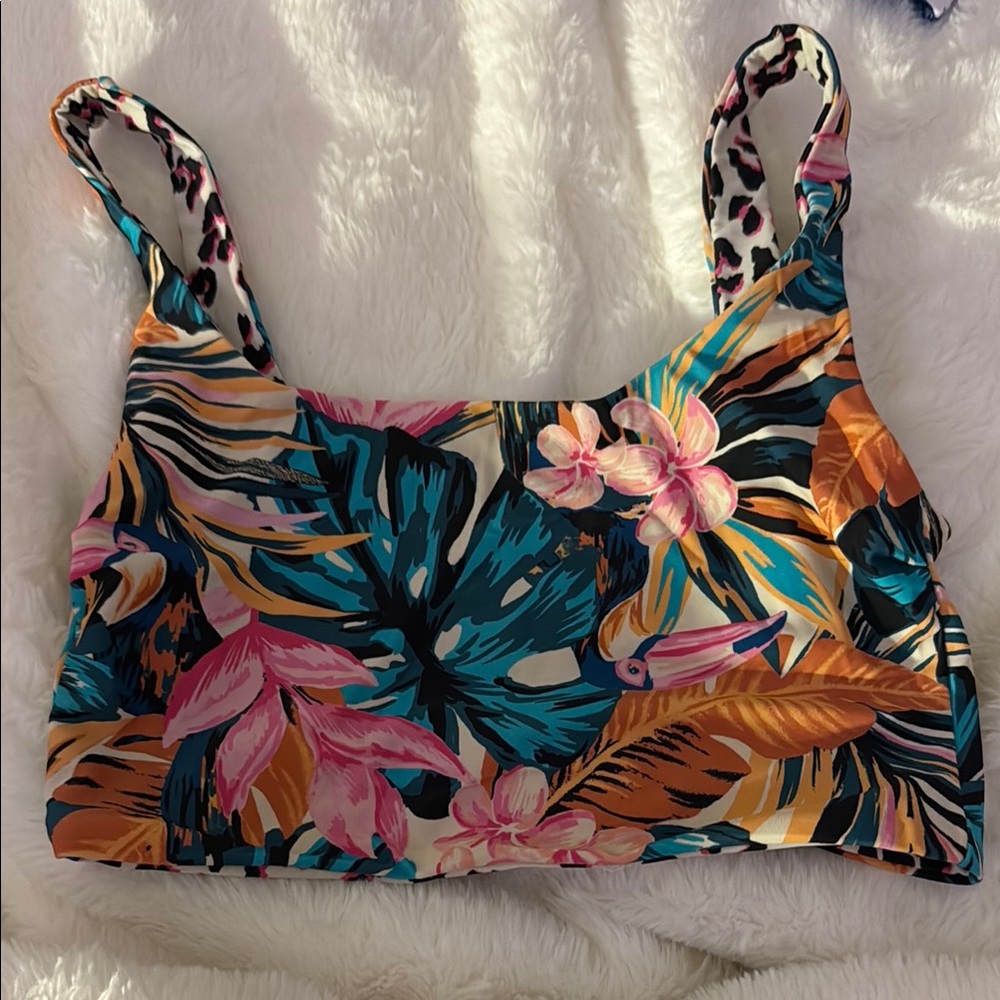 Reversible pink and black cheetah print and pink and green flower and leaf print